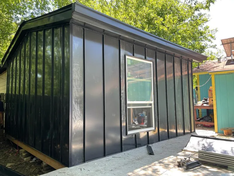 Black standing seam metal wall panels for Metal Roof Installation in Howell